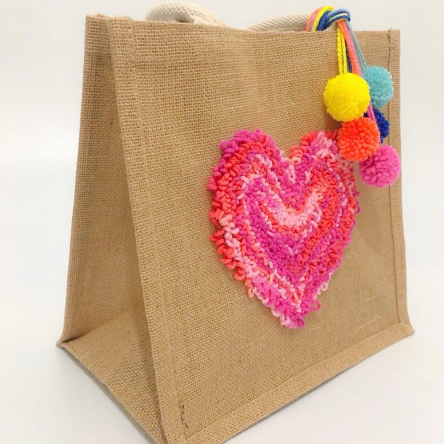 BOLSA DE CORAZON TONOS ROSAS