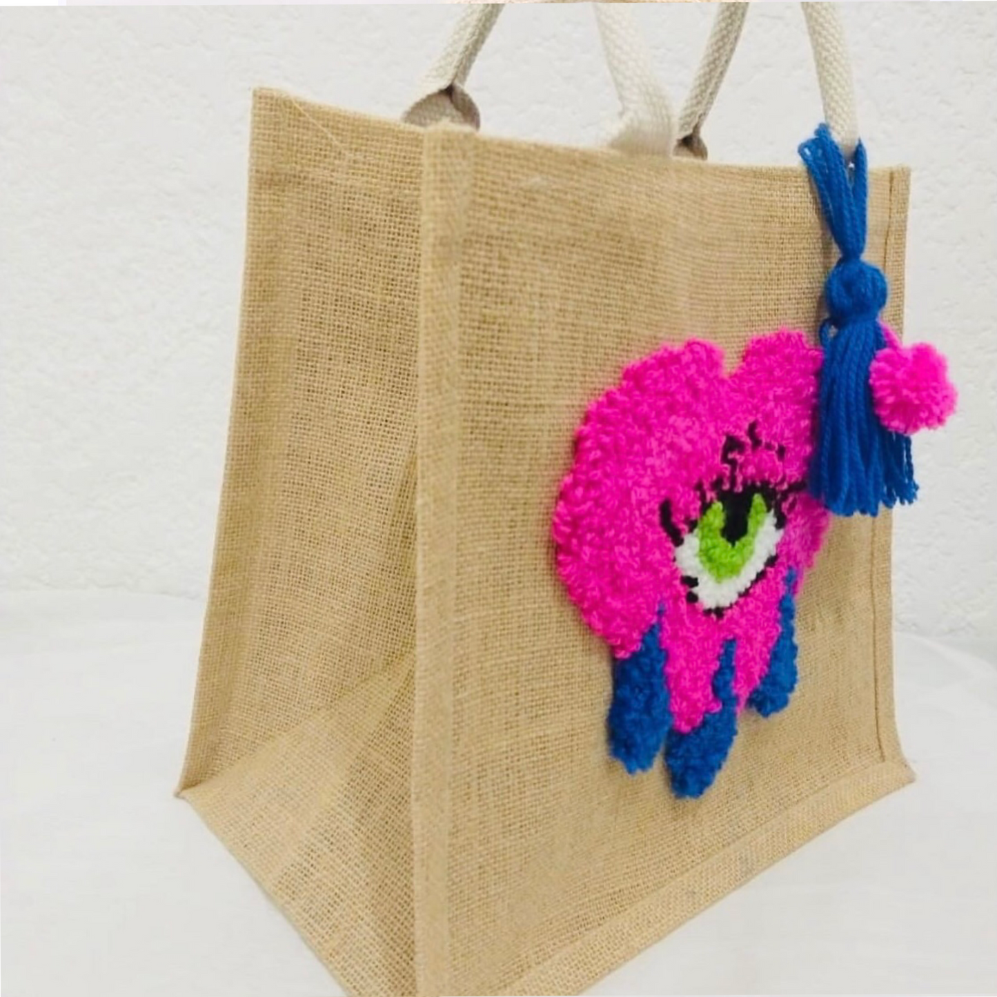 BOLSA DE CORAZON CON OJO