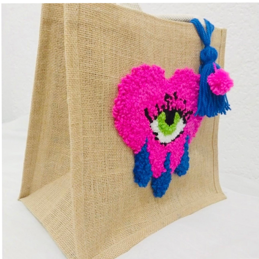 BOLSA DE CORAZON CON OJO